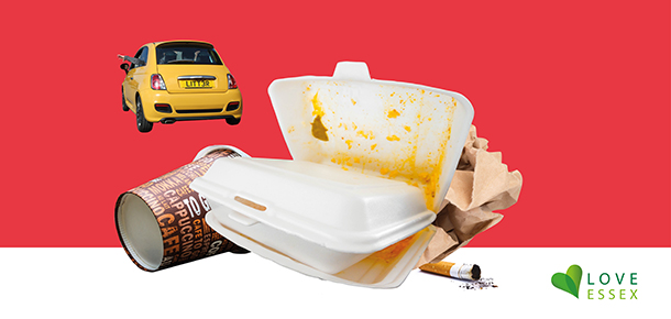 A yellow Fiat car and take away litter and cigarette butts.