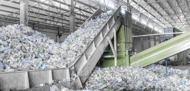 Plastic bottles being recycled in a plastic recycling facility.