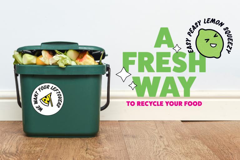 Food caddy filled with food, with a sticker on the front reading 'We want your leftovers'. Green and pink text to the right reads 'A fresh way to recycle your food'. 